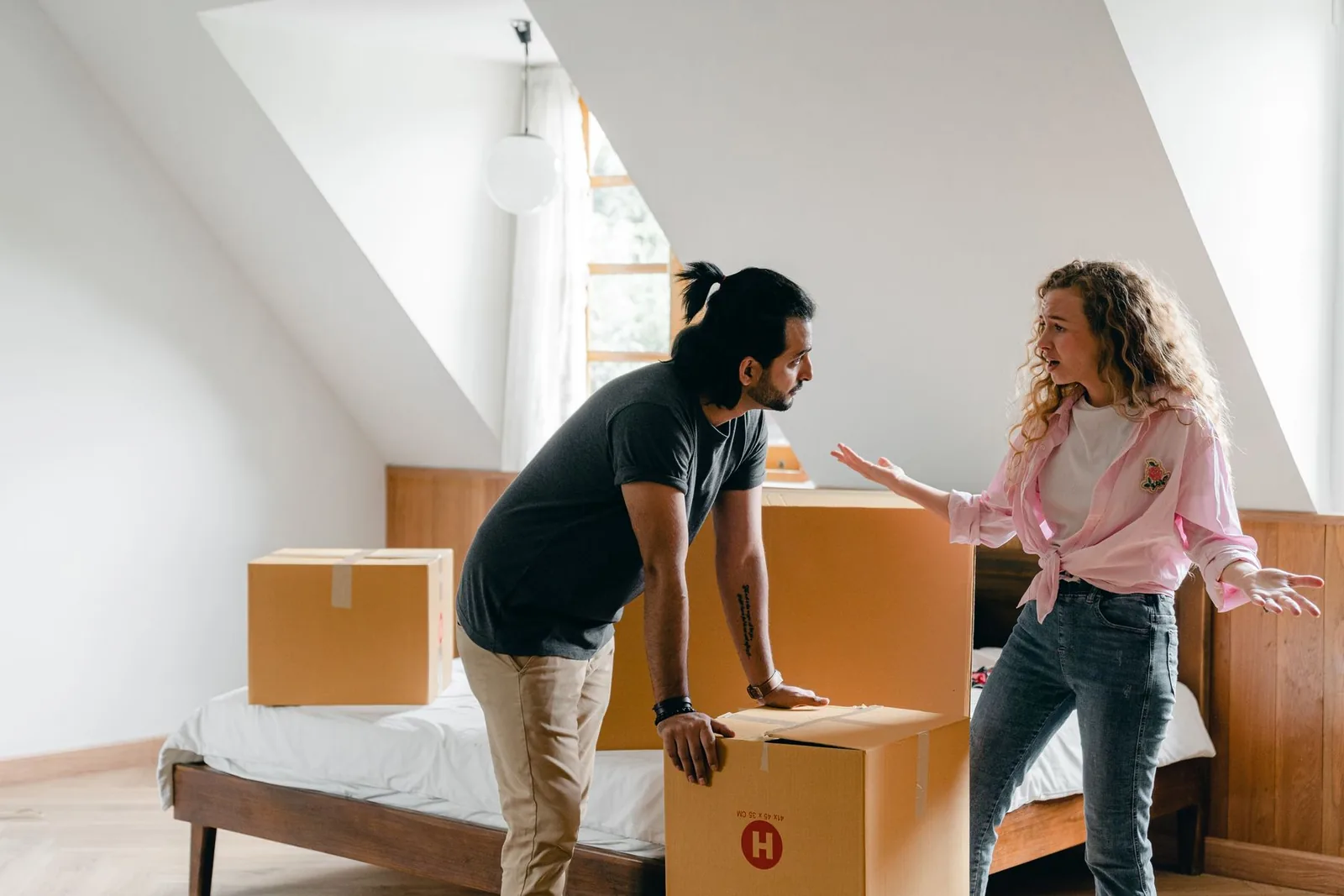 Two adults communicating with attentive body language